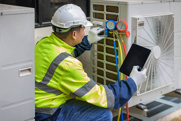 Professional Air Conditioning Repair technician working in Jackson Center, OH